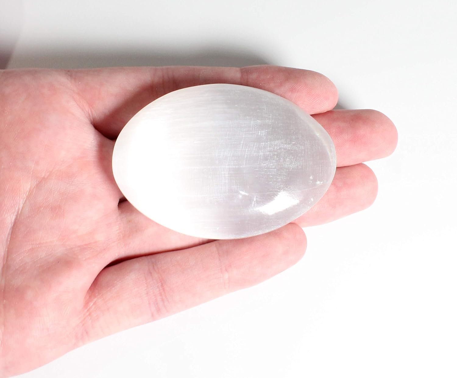 White selenite palm stone crown chakra energy clearing crystal